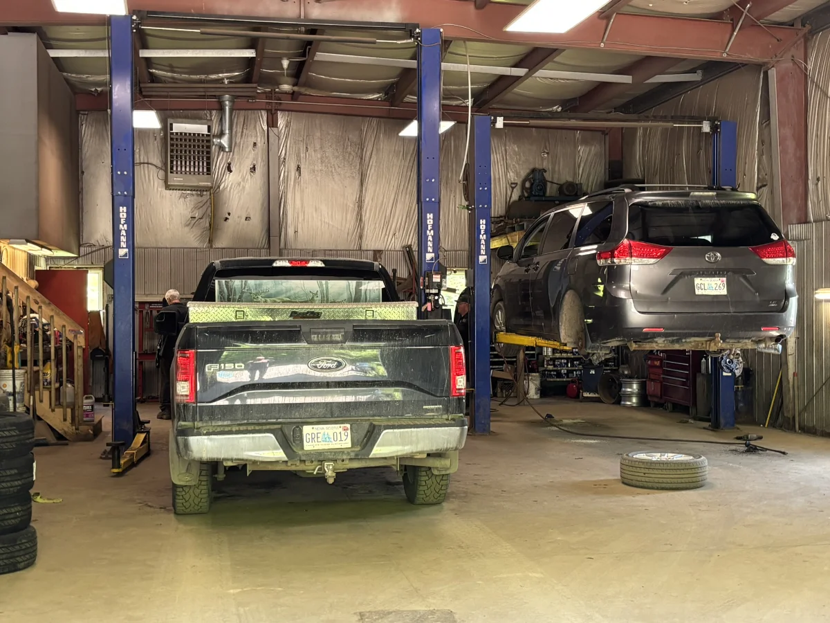 Vehicles on the lifts in Joe's shop